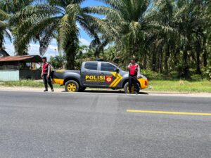 Patroli Presisi Polres Batu Bara Jaga Keamanan Simpang Jalinsum Indrapura-Medan di Laut Tador