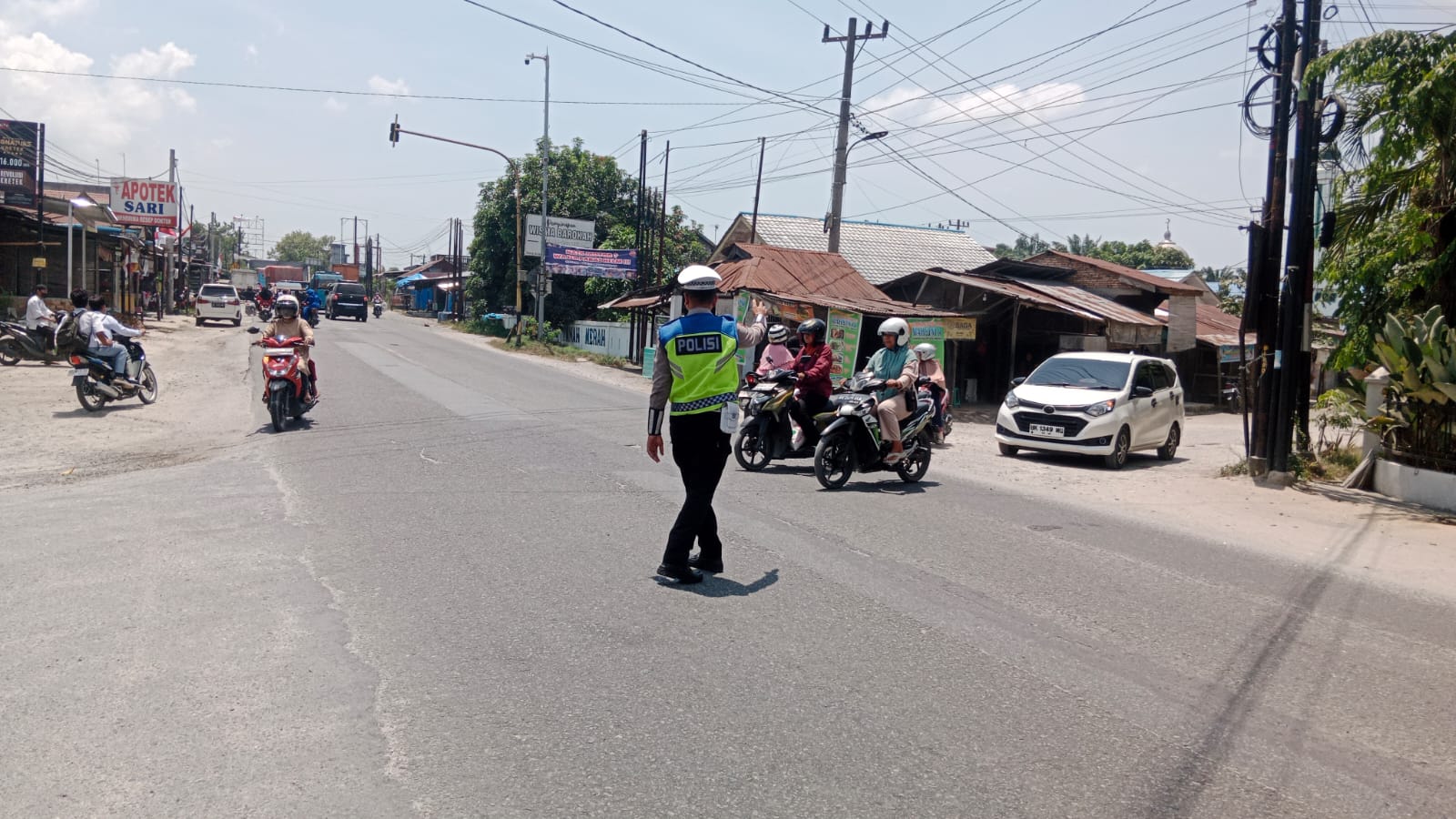 Sat Lantas Polres Batu Bara Rutin Gelar Pengaturan Lalu Lintas Siang di Simpang Tanah Merah