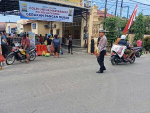 Satlantas Polres Batu Bara Sukses Amankan Lalu Lintas Gerakan Pangan Murah di Depan Mako Polres, Masyarakat Apresiasi