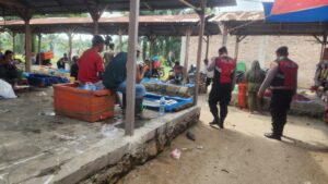 Sat Samapta Polres Batu Bara Gelar Cooling System di Pekan Desa Bandar Tinggi, Imbau Masyarakat Waspada